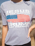Make two statements in one with this "Jesus Is My Savior, Trump Is My President" short-sleeve t-shirt.  Available in Navy Blue, Light Blue, and Heather Grey. Size M-XXXXL. 
