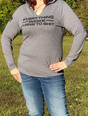 Wear a statement in this Women's Everything Woke Turns to Shit long-sleeve, V-neck Hoodie Tee Shirt in dark Heather Grey (with black lettering). Size S-XXL.