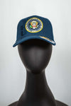 This Presidential Seal 45th President Signature Hat is class act. Trump's famous signature is embroidered in gold. Pictured in Navy Blue.