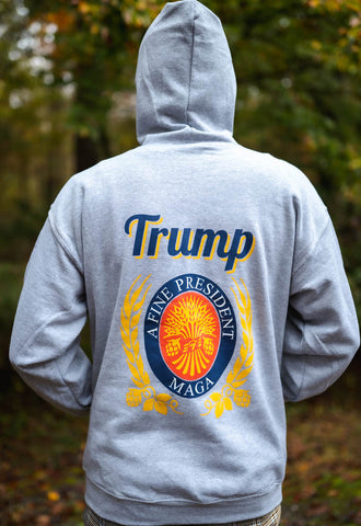 Don our Trump A Fine President Hoodie sweatshirt in Zip-Front and Pullover styles. Available in Heather Grey. Size M-XXXXL.