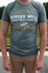 Border Wall Construction Co., Build The Wall Deport Them All T-Shirt.  Available in Navy Blue or Heather Gray. Size M-XXXXL. 
