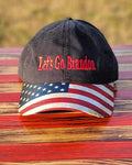 Show them how you really feel wearing this LET'S GO BRANDON embroidered in red on the front. Available in Black with American Flag design bill and adjustable fabric strap. #LetsGoBrandon #LGB 