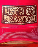 Trucker-Style Let's Go Brandon Leather Patch Hat with white mesh back.  The leather patch is custom made, hand-cut, and hand-stamped in the USA. Available in Red + 2 other colors (see Orange, and Pink).