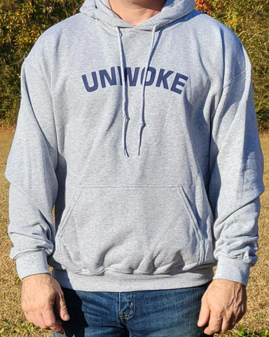 State it succinctly wearing this UNWOKE hoodie sweatshirt. Available in Grey with navy blue messaging. Size M-XXXXL.
