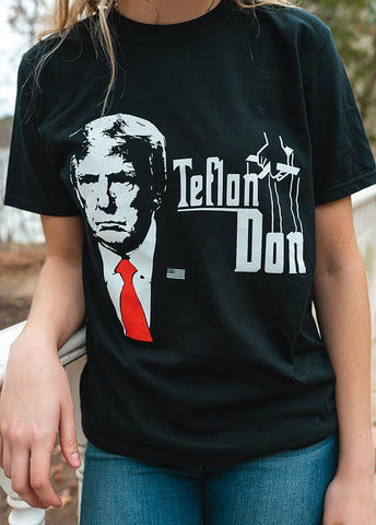 You'll be sure to turn some heads wearing our TEFLON DON short-sleeve T Shirt. Available in Black. Size M-XXXL.