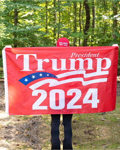 This President Trump 2024 Flag is available in Red or Blue, measures 3' x 5', and is made of durable nylon.  We offer fast shipping and handle each order with care. 