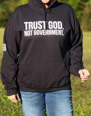 Wear the truth! This "Trust God. Not Government." pullover Hoodie sweatshirt is available in Black. Size M-XXXXL.